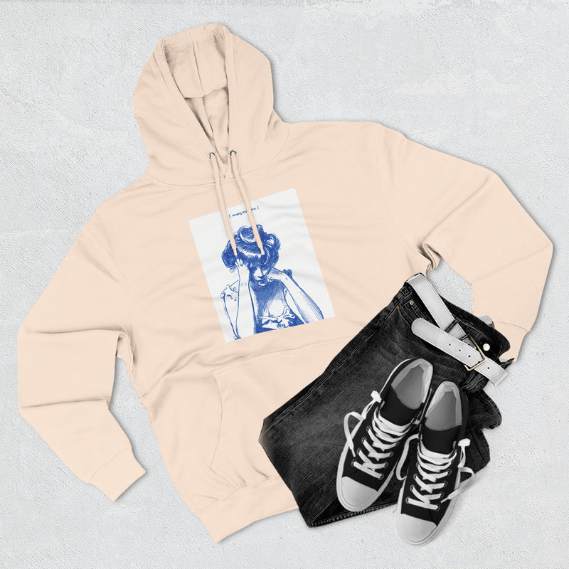 Artistic Female Silhouette Hoodie – Stylish Blue Figure Design on Cozy Beige Sweatshirt