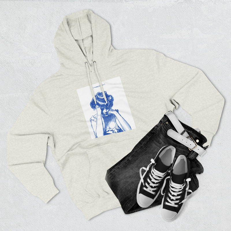 Artistic Female Silhouette Hoodie – Stylish Blue Figure Design on Cozy Beige Sweatshirt