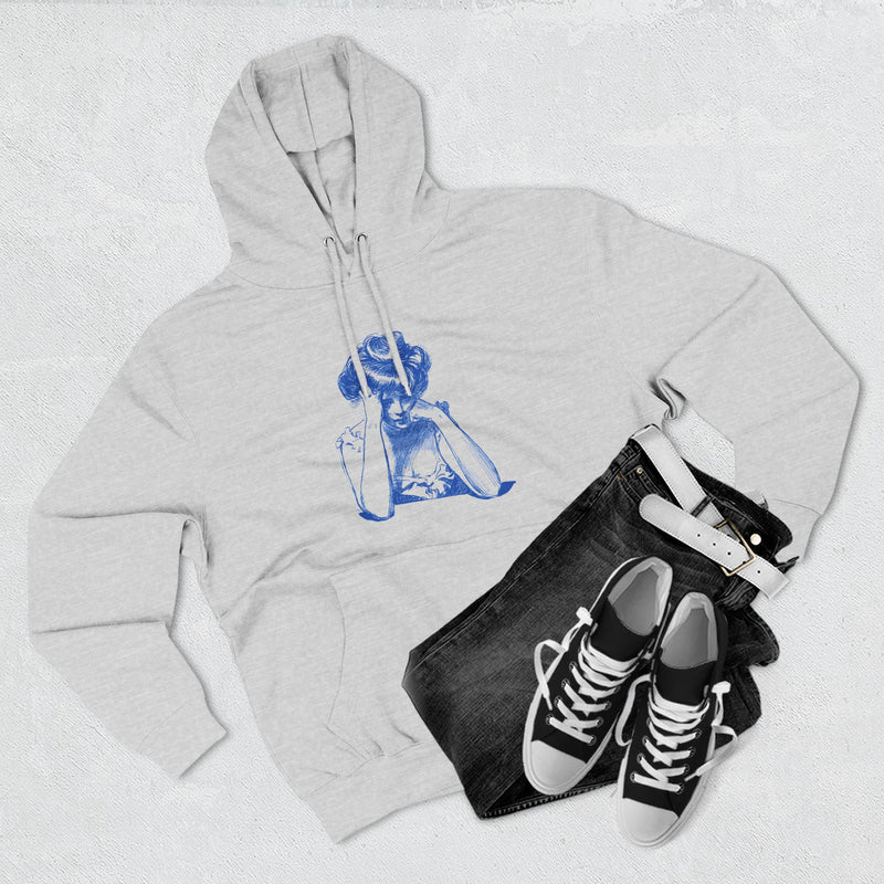 Artistic Female Silhouette Hoodie – Stylish Blue Figure Design on Cozy Beige Sweatshirt